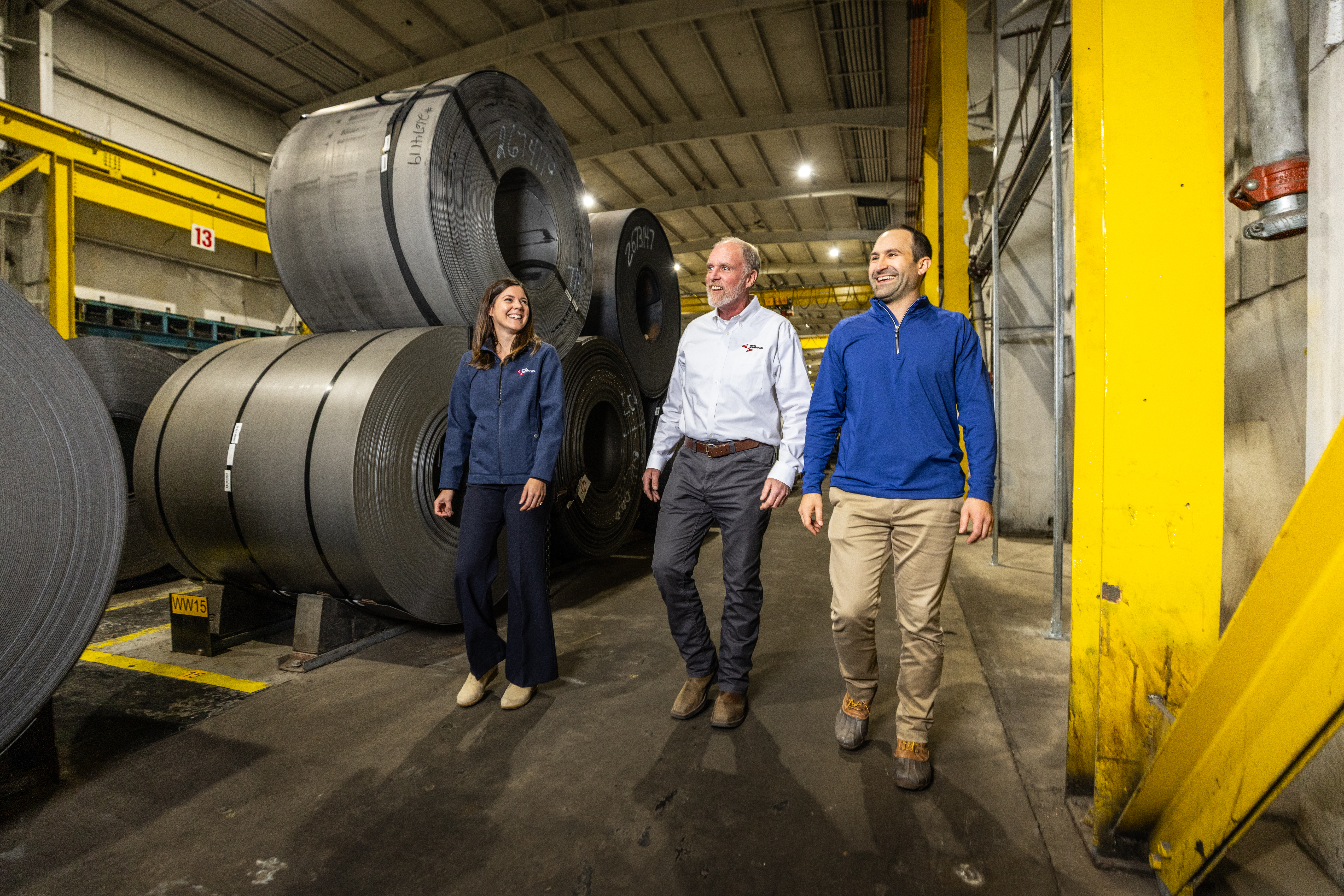Steel Warehouse team by steel coils