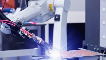 Automatic welding robot in a modern factory in operation.
